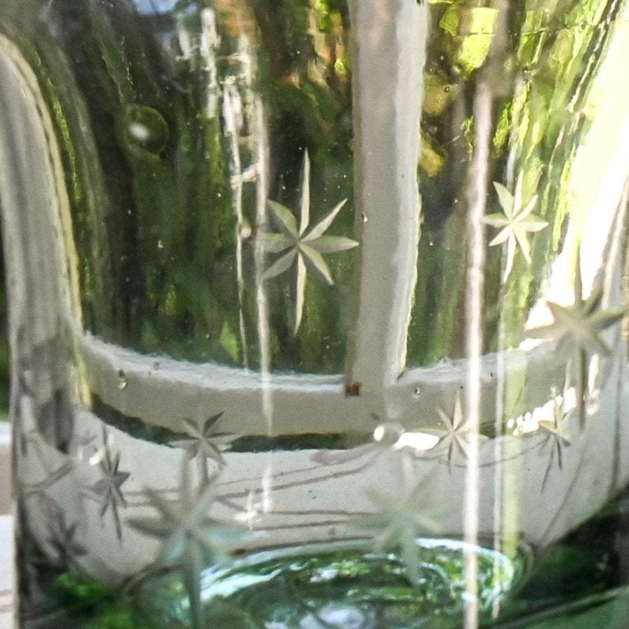 Star etching on a clear vase