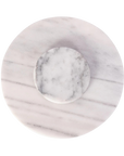 Round marble coaster with a smaller circular inset on a white background