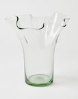 Clear glass vase with a unique design on a white background