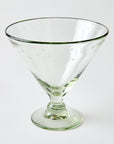 Clear footed dish glass etched with stars on a white background
