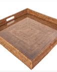 Woven rattan tray on a white background