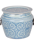 Blue and white ceramic planter with floral patterns on a white background