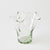 Clear glass vase with wavy design on a white background