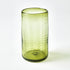 Green textured glass vase on a white background