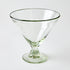 Clear footed dish glass etched with stars on a white background